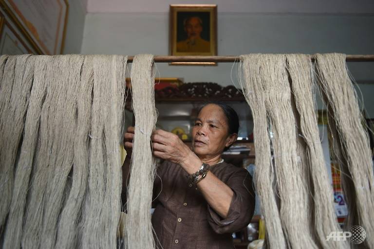 The "silk" is harvested from the fibrous pith in lotus stems, which would otherwise be