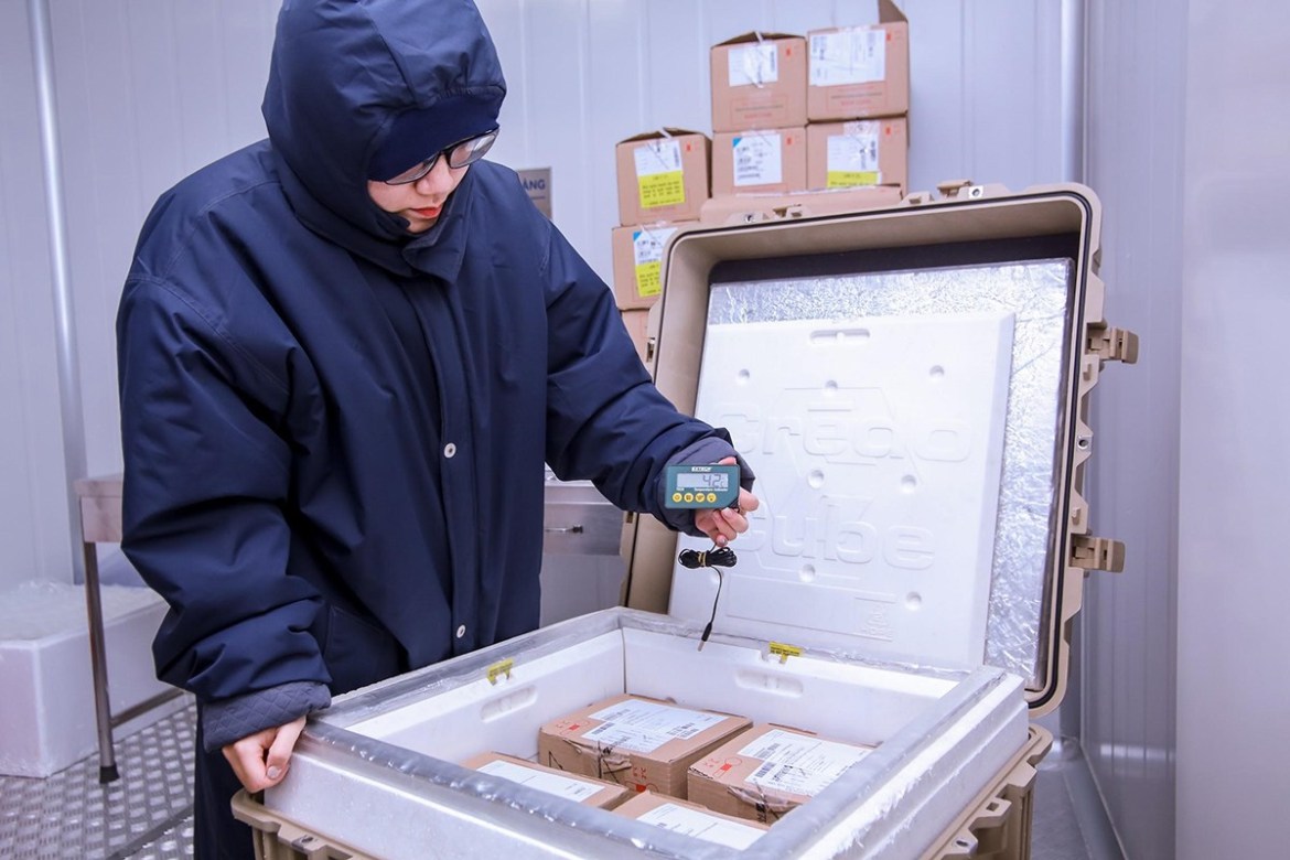 A VNVC staff checks a package of the newly-arrived vaccine. It is not yet clear who will get the doses that have arrived, but the ministry had said earlier that frontline Covid-19 workers, teachers and people working in aviation and tourism will be among the first to get vaccinated. The government has waived duties and the vaccines will get priority clearance to make sure they reach VNVC as fast as possible. The company has set up cold storage units in HCMC, Da Nang and Hanoi to store three million doses at a time. Covax, a global mechanism for developing, manufacturing and procuring Covid-19 vaccine candidates that help member countries access vaccines as they become available, has pledged to provide Vietnam with 4.9 million doses of the AstraZeneca vaccine in the first half. Around 33 million doses will arrive in the second half of this year.