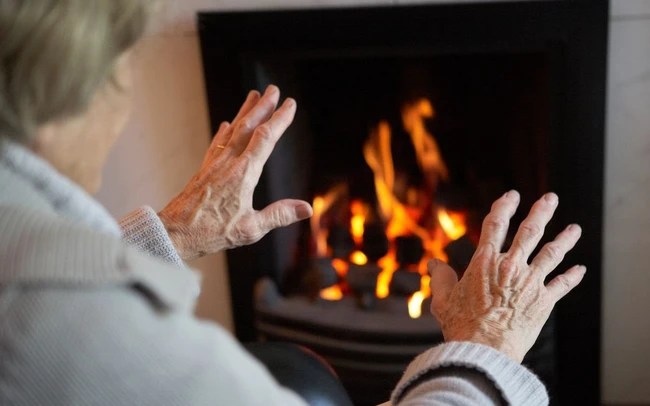 Many Americans would rather endure the freezing cold without turning on the heater to save money: 'We're like living in an igloo'