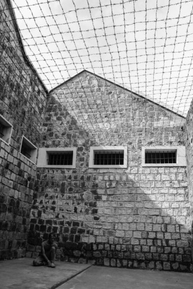 Recreate the scenario of tortured prisoners in the stone cellar.