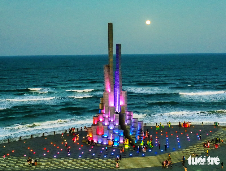 Nghinh Phong Tower shimmers with color at night