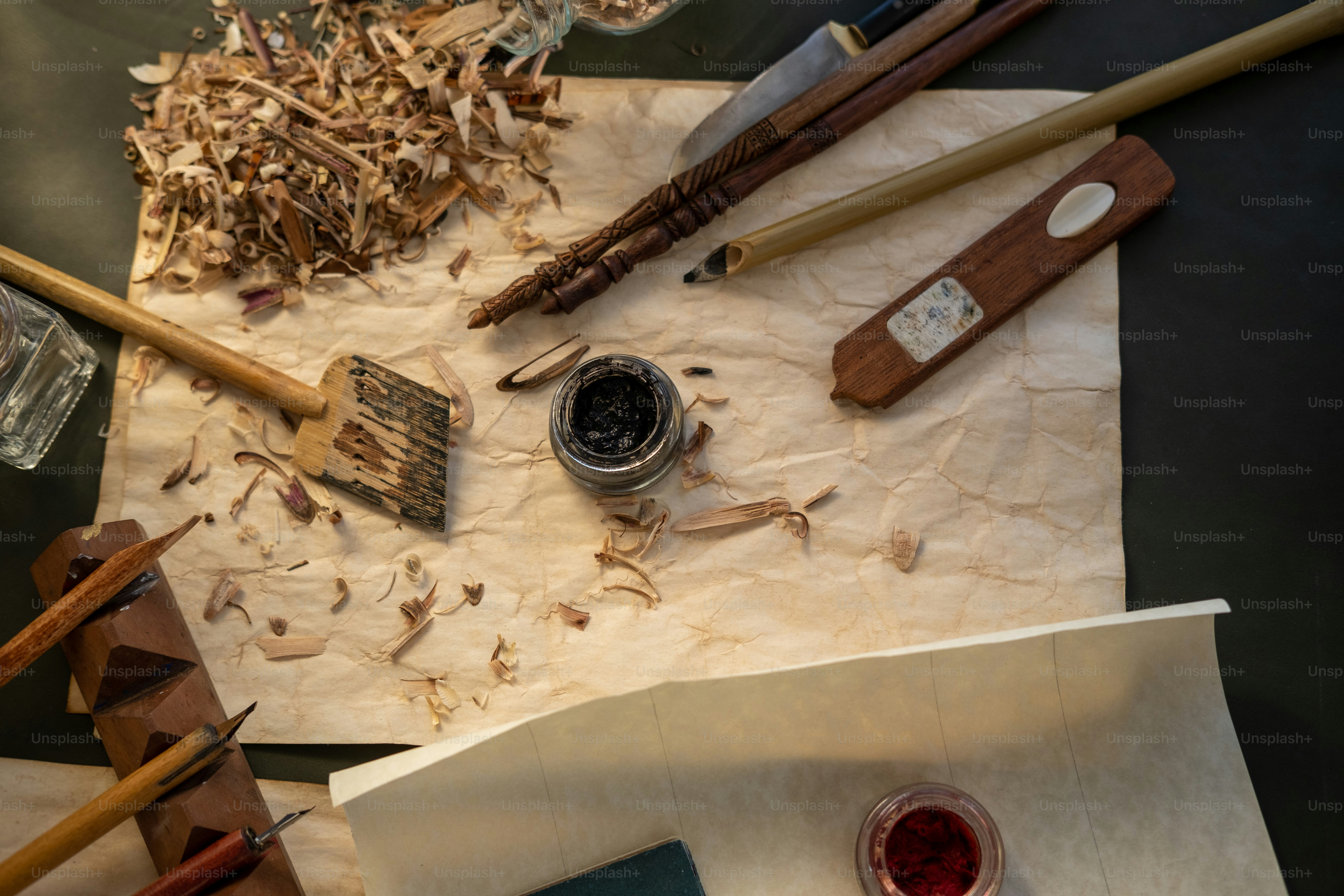 a bunch of wood shaving tools on a piece of paper