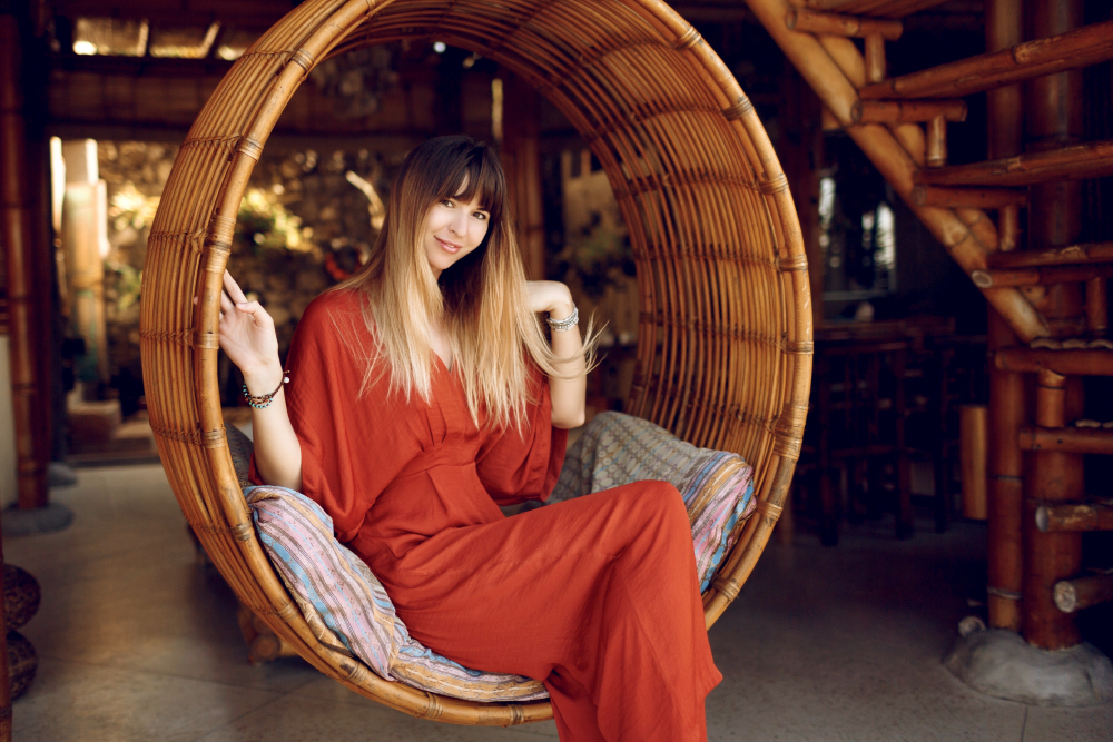 Girl sitting on a hammock
